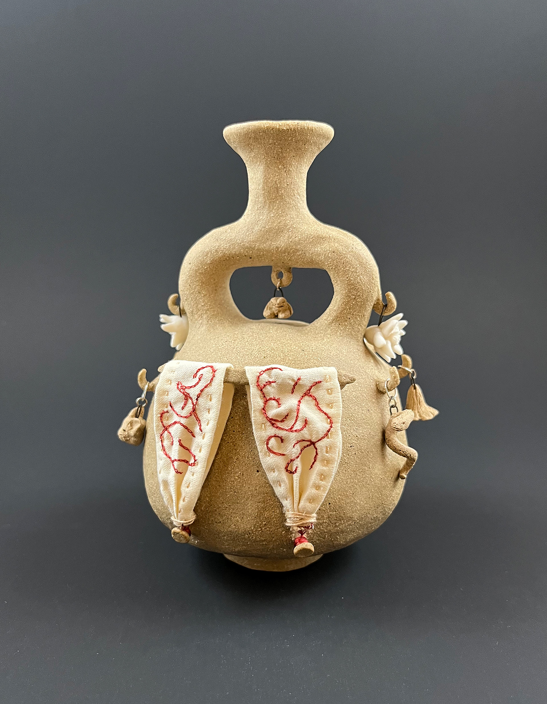 2026, Flor de La Pradera, 6.5" x 4" x 4", ceramic, cotton, silk thread, and steel
