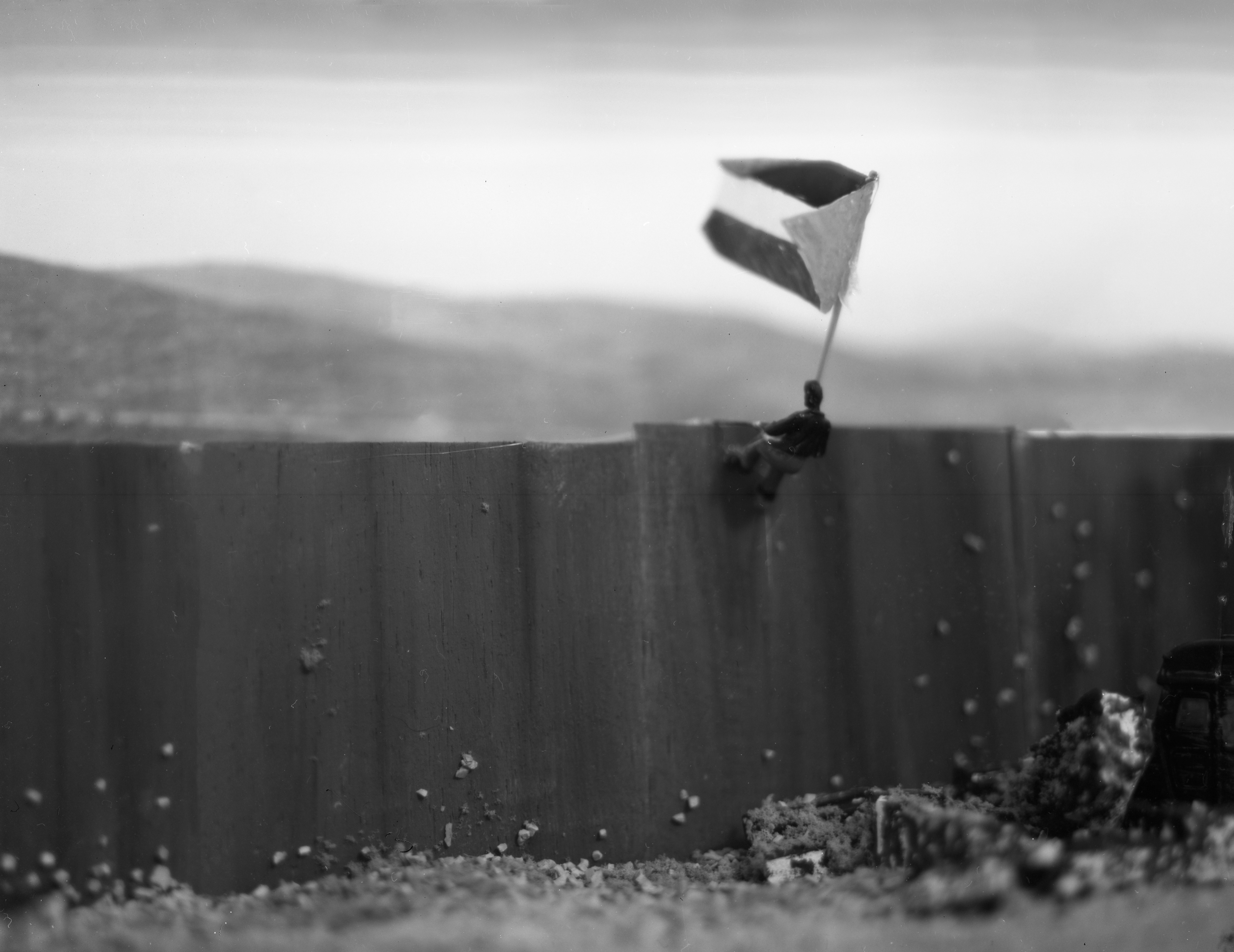 Inspired by David Levinthal's photography, this piece serves as a commentary on the conflict in the Middle East