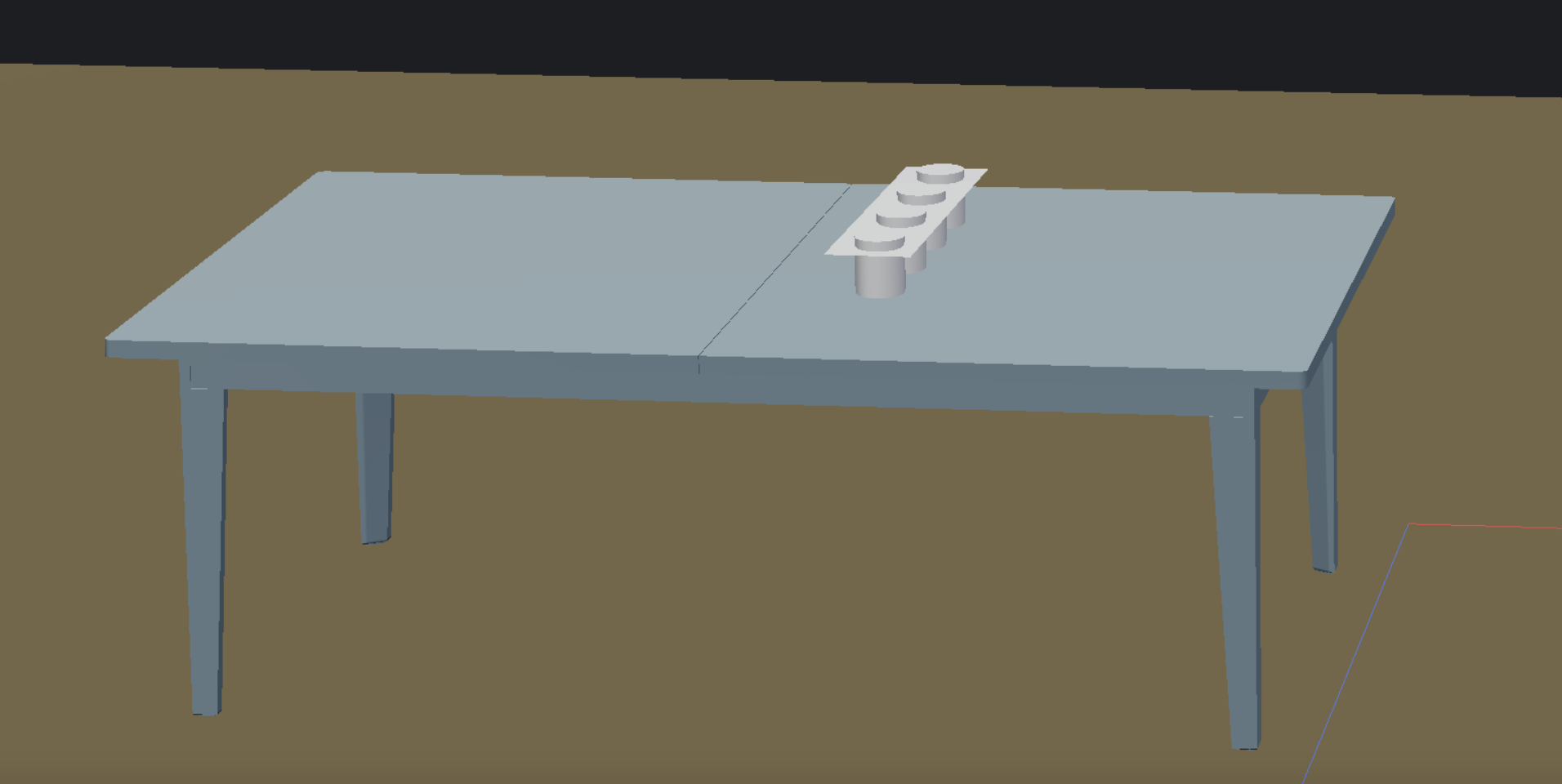 Established a floor plane, imported desk from Bezel library. Grouped cylinders and button panel.