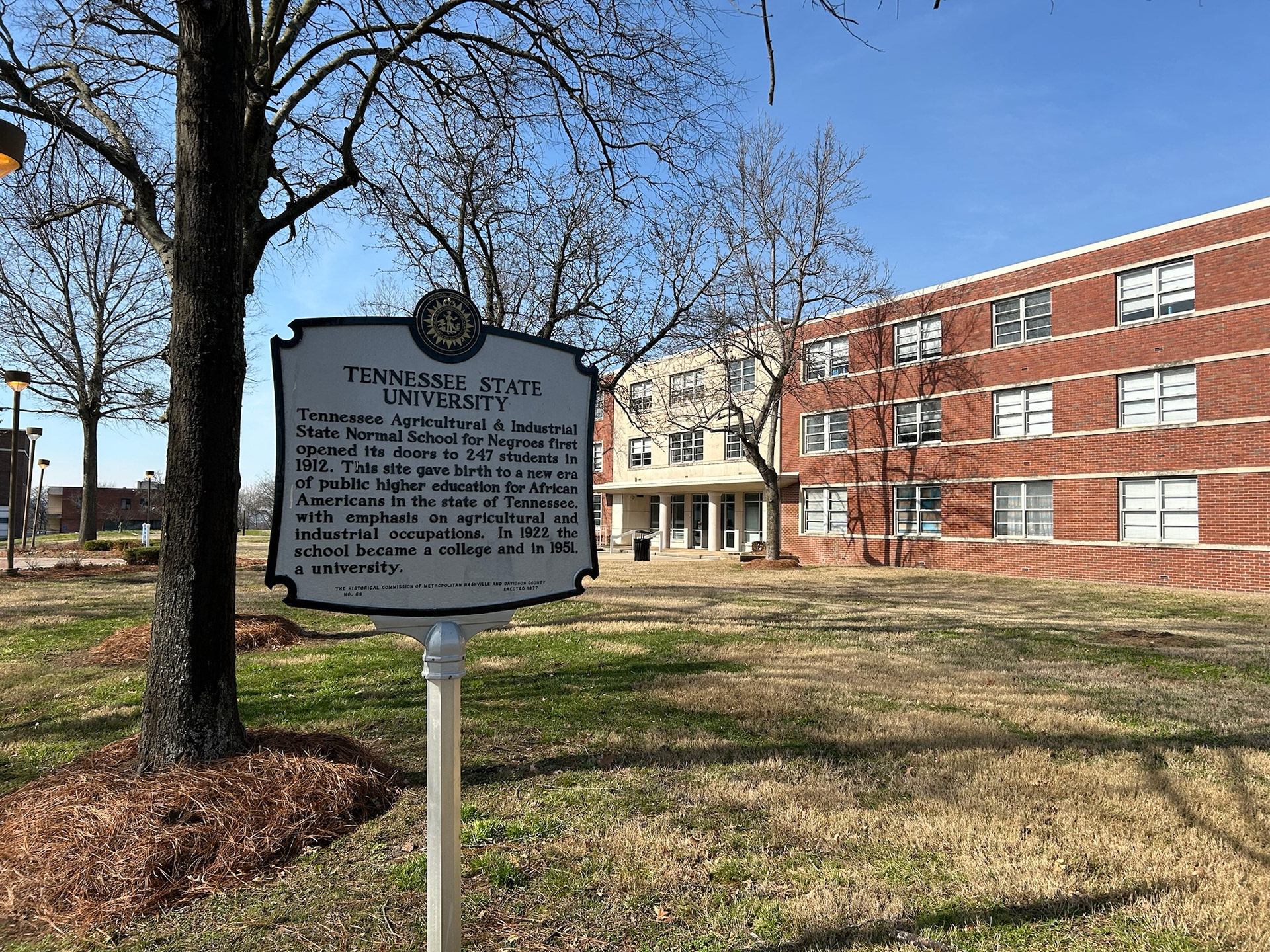 A plaque describing the history of Tennessee State University.