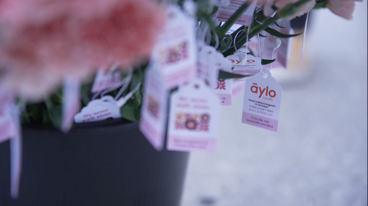 Flower tags for Breast Cancer Awareness Guerilla Marketing Campaign.