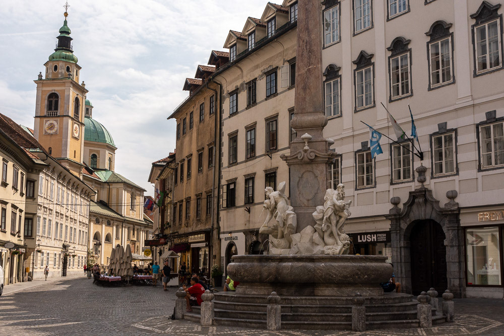 The Robba Fountain, one of Ljubljana's best known Baroque monuments, also known as The Fountain of Three Carniolan Rivers, stands at the edge of the Mestni trg (Town Hall square.)