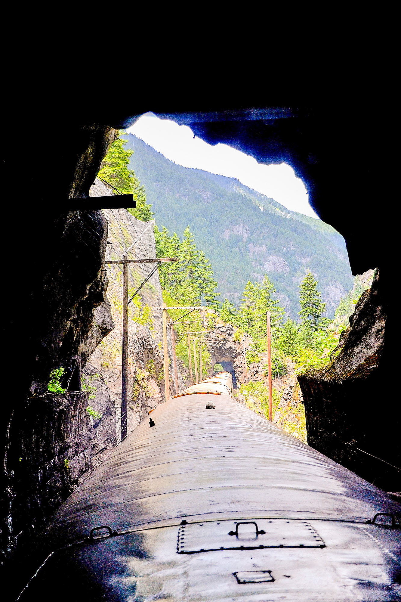 Passing through the first of many tunnels hacked through rock.