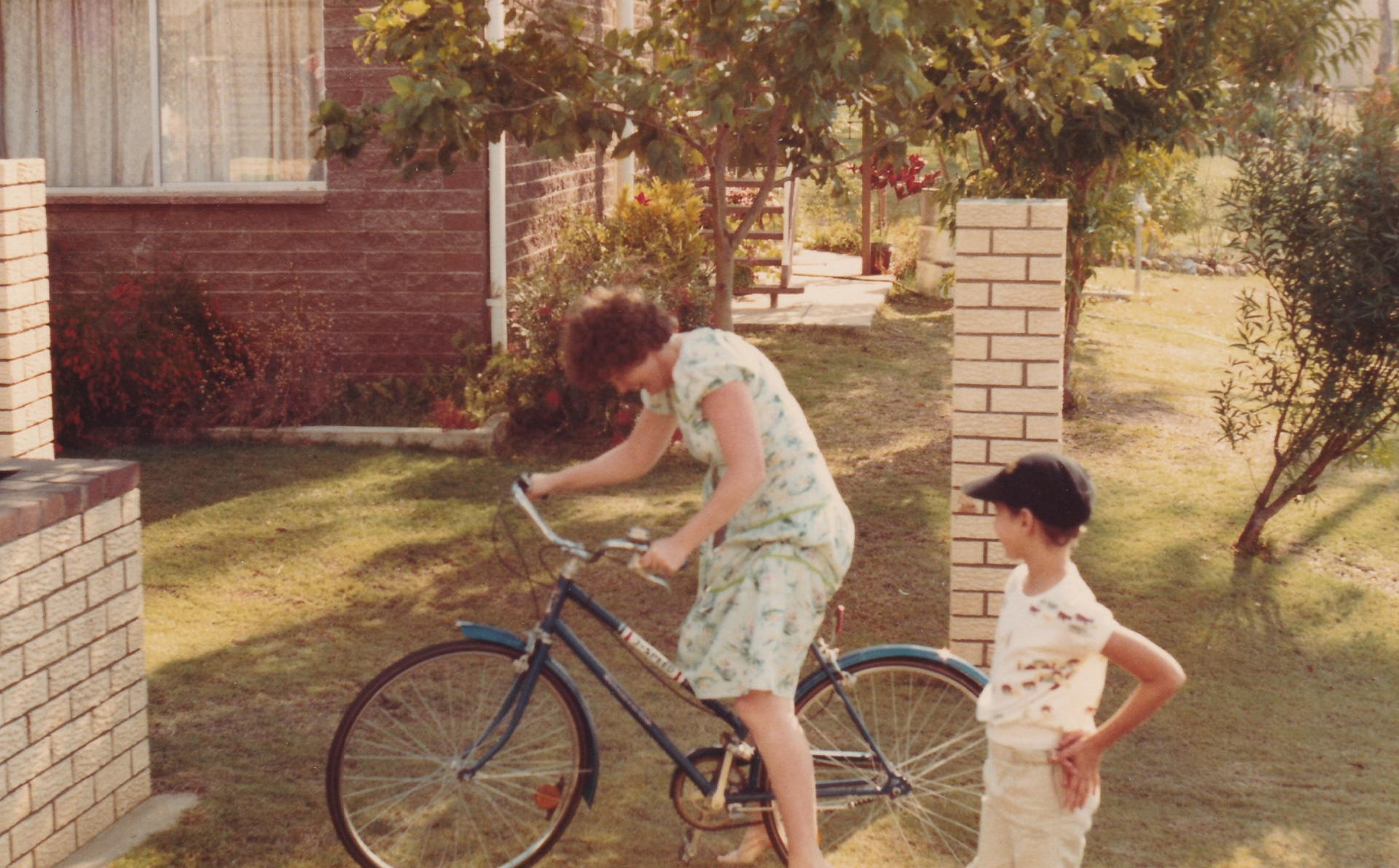 Tracy's new bike being road tested by Geraldine Forsythe