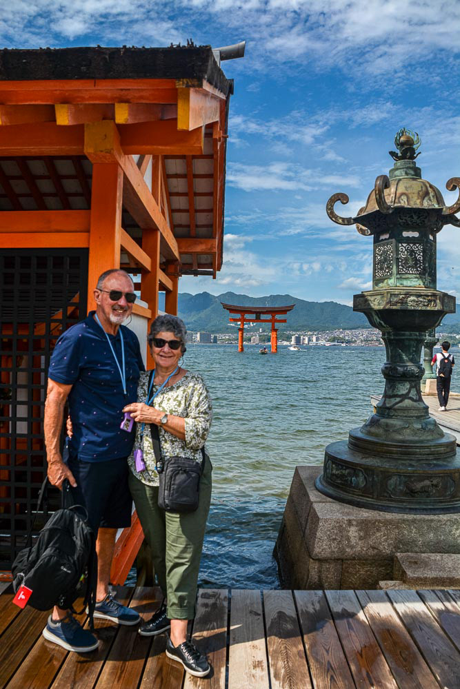 Our Itsukushima Shrine photo portrait with the famous floating Torii gate in the background.