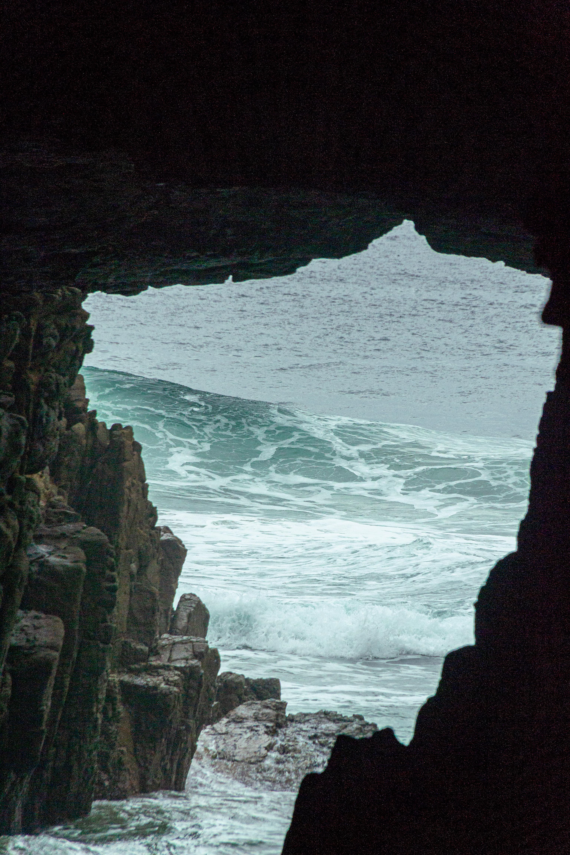 The opening, of Remarkable Cave when. viewed from the platform, resembles the shape of Tasmania.