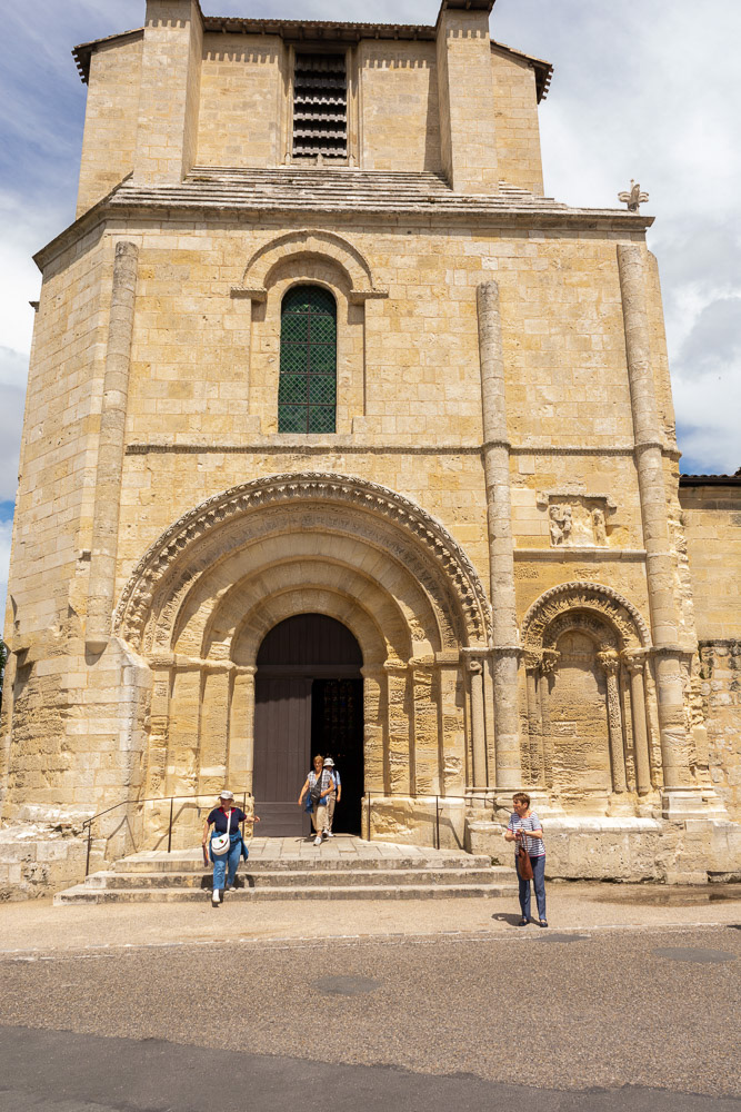 The main entrance to Eglise collegiale, 14th century Romanesque church.