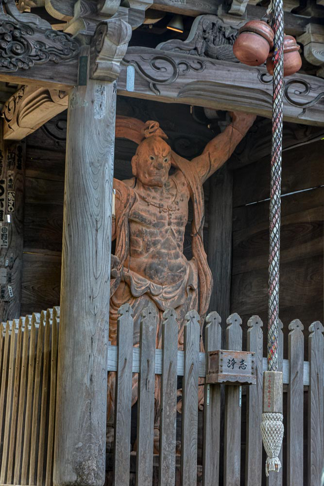 Guardian gods at the Daisho-in gateway.