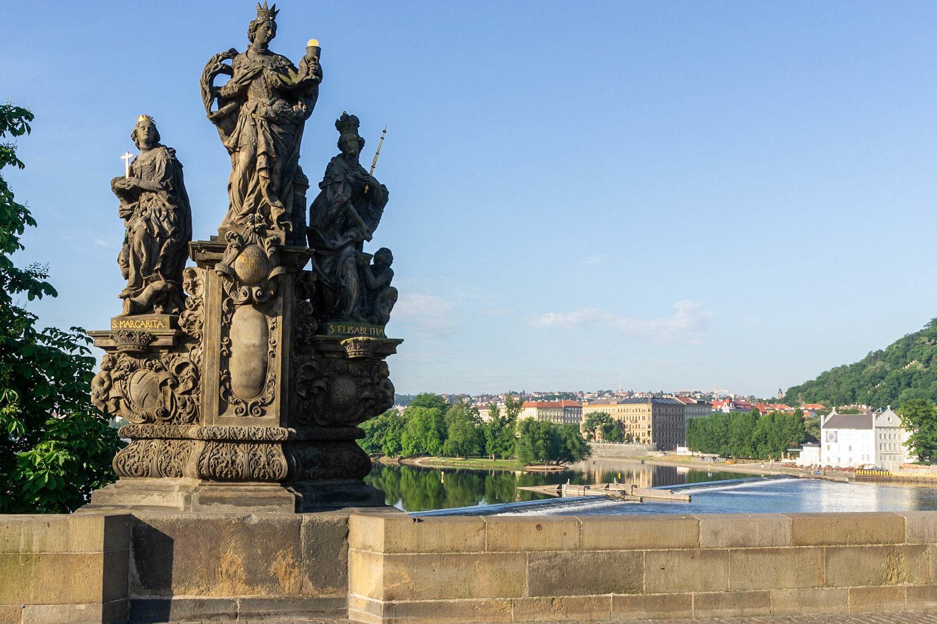 Saints Barbara, Margaret and Elizabeth grace the southern side of Charles bridge