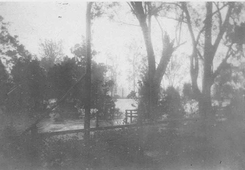 Flood water from the Callide Creek at the rear of the farm house.