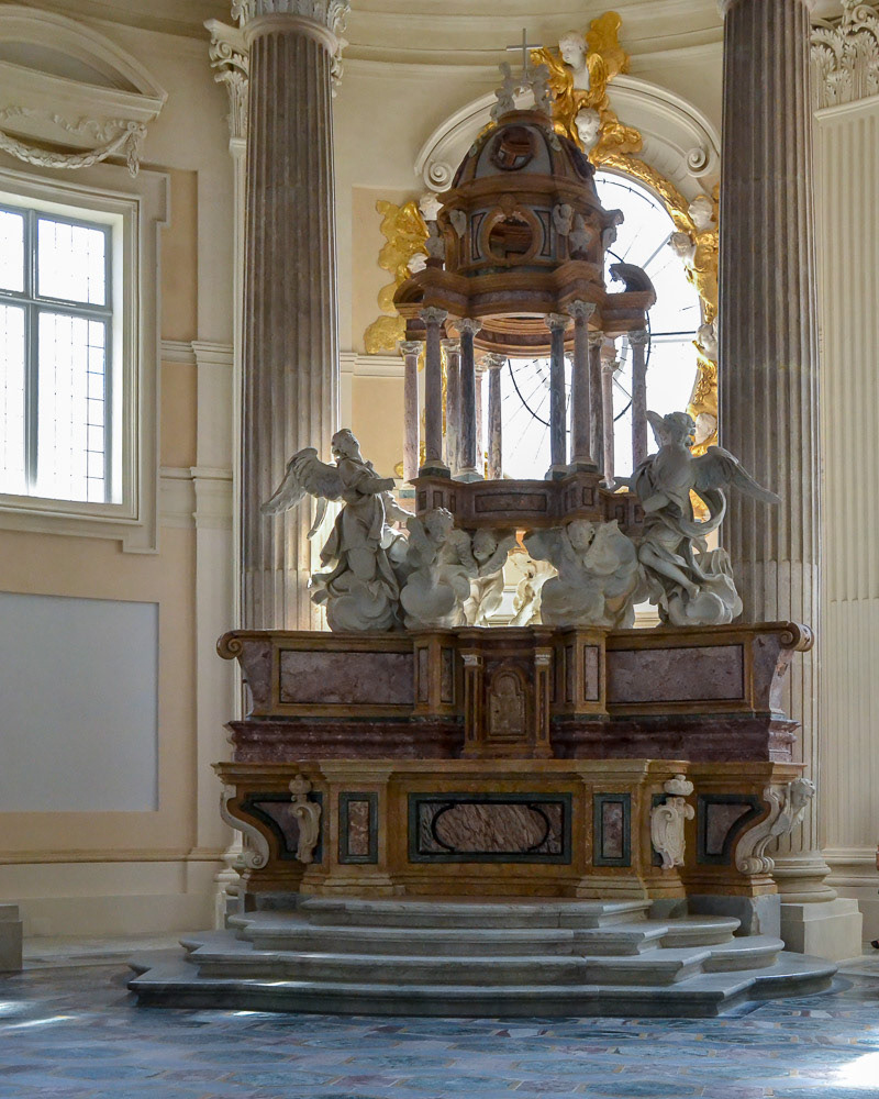 Chaple of St Hugo's ornate marble and stucco ornamental font.