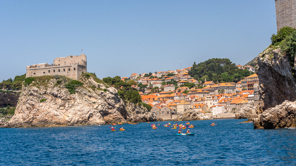 Kayaks in Kolorina Bay, Fort Lovnienac on the left.
