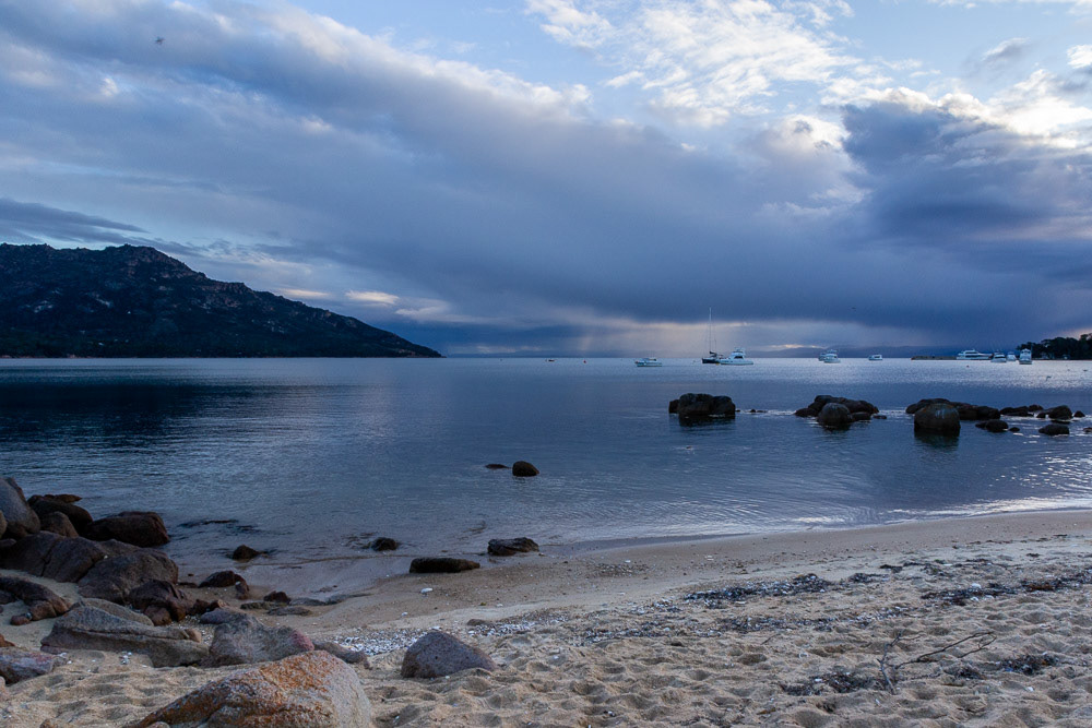 A storm sweeps across the bay.