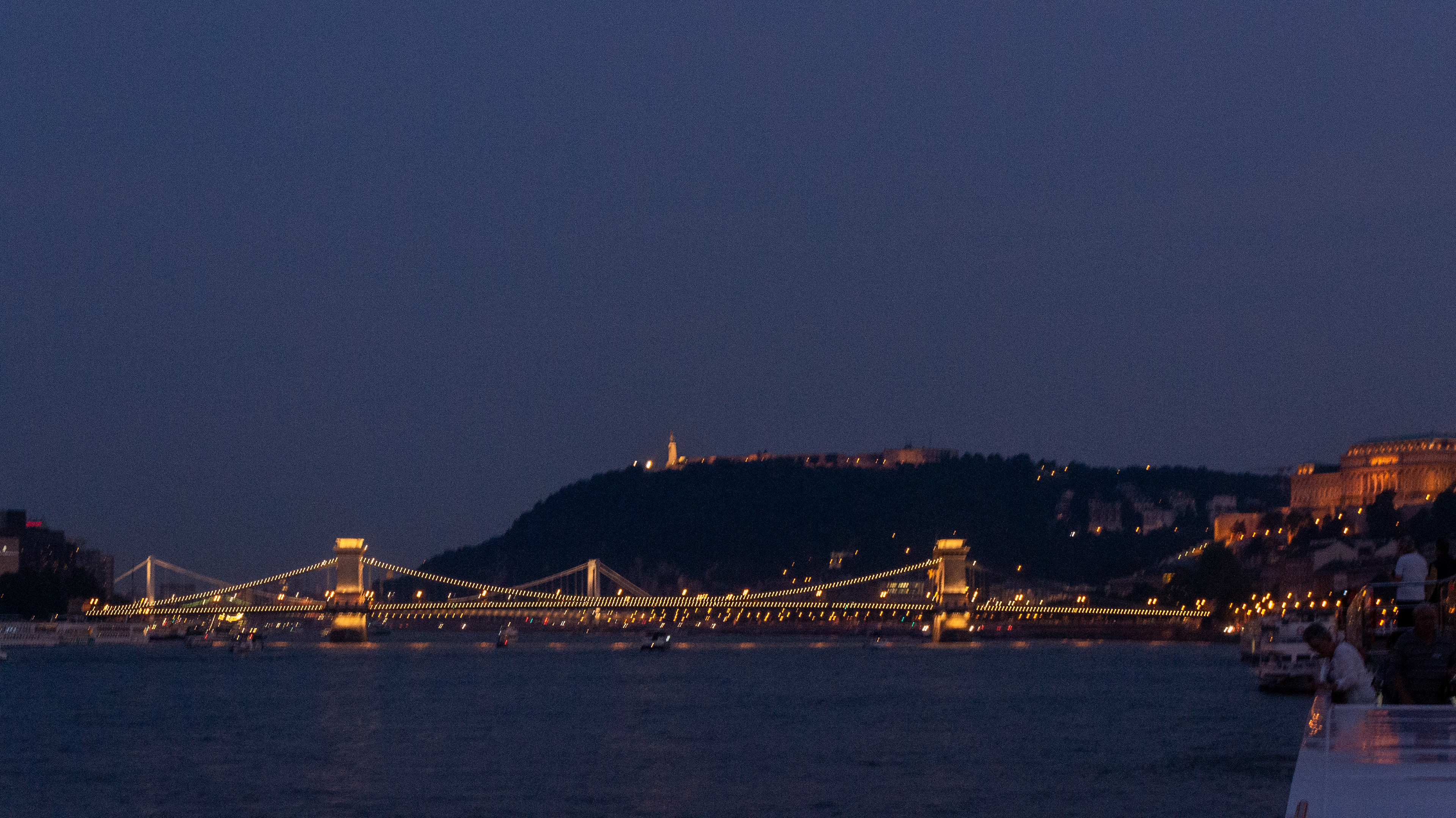 The famous Chain Bridge over the Danube lights up at night.