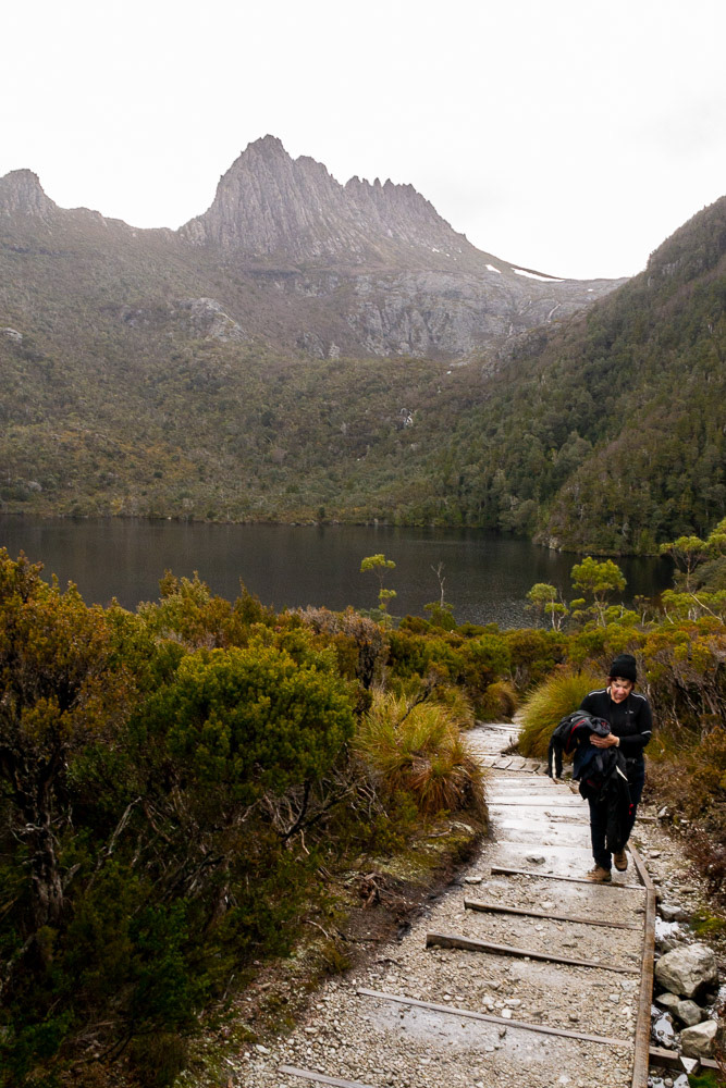Cher negotiating the final climb approaching the boatshed. It's been a day fo changing fortunes, crisp blue sky at the start of the treck, torrential rain mid-way around and now low cloud mist.