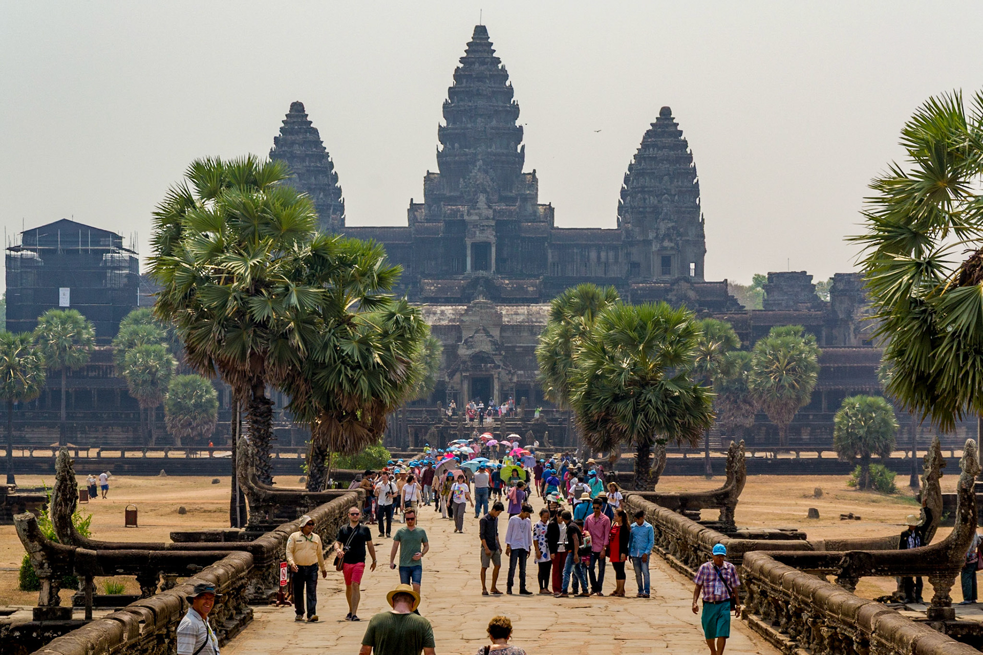 Tourists line the concourse near the entry to the main temple.