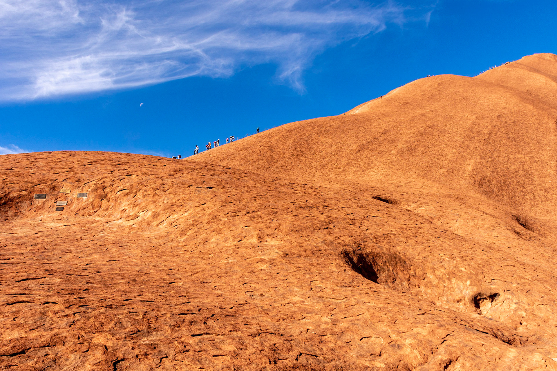 It's a long way to the top .............. hundreds of tourists still venture up the face of Uluru despite the wishes of the traditional owners