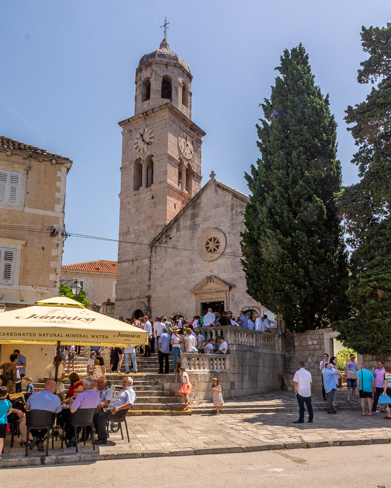 Cavtat - Locals gather outside a church in the old town.