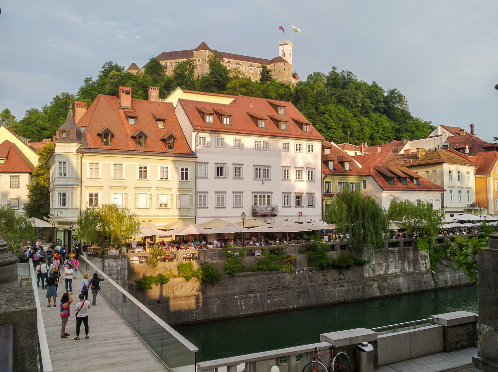 Ljubljana Castle high on the hill dominates the skyline behind the Old Town.