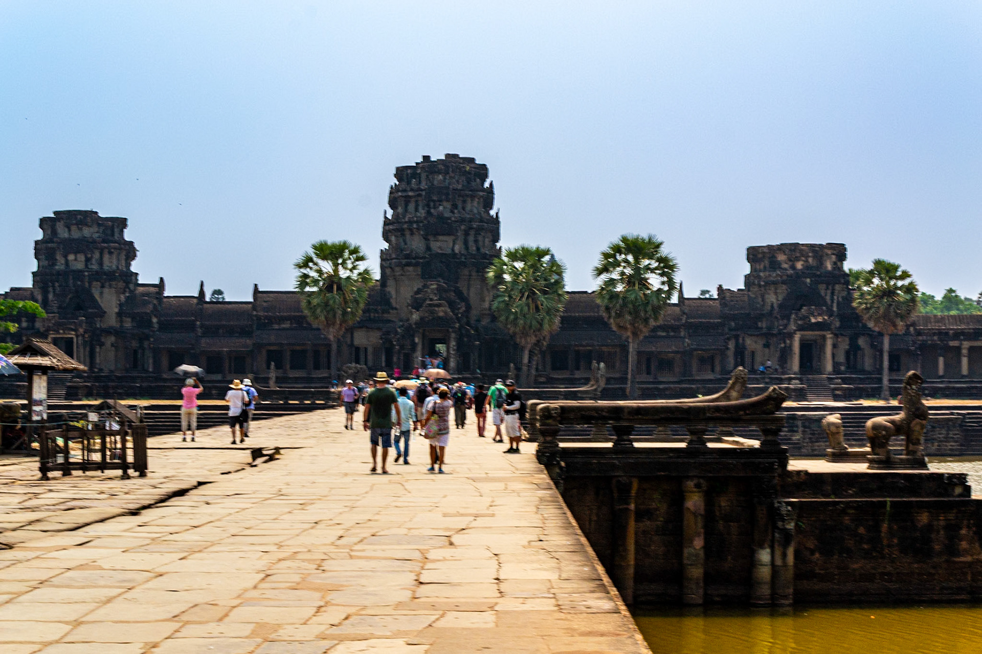 Crossing the moat via a stone causeway.