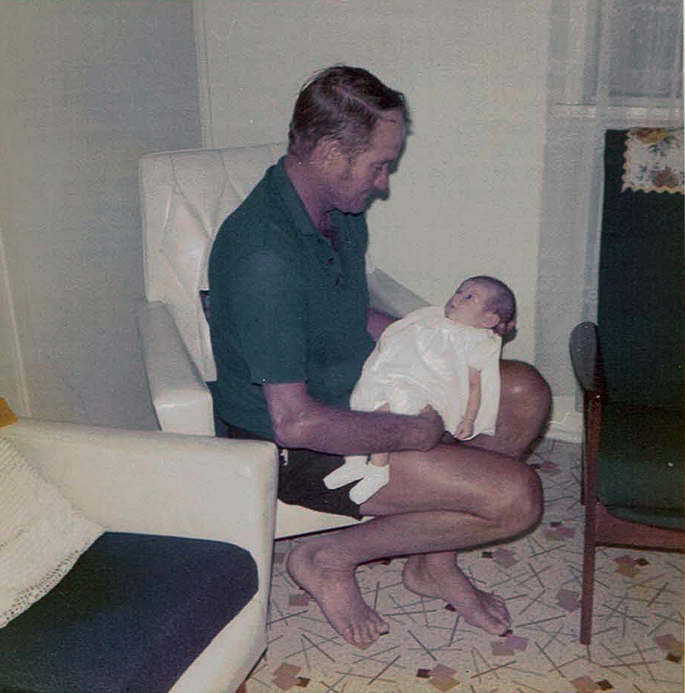 Ed holding Tracy, Biloela 1973.