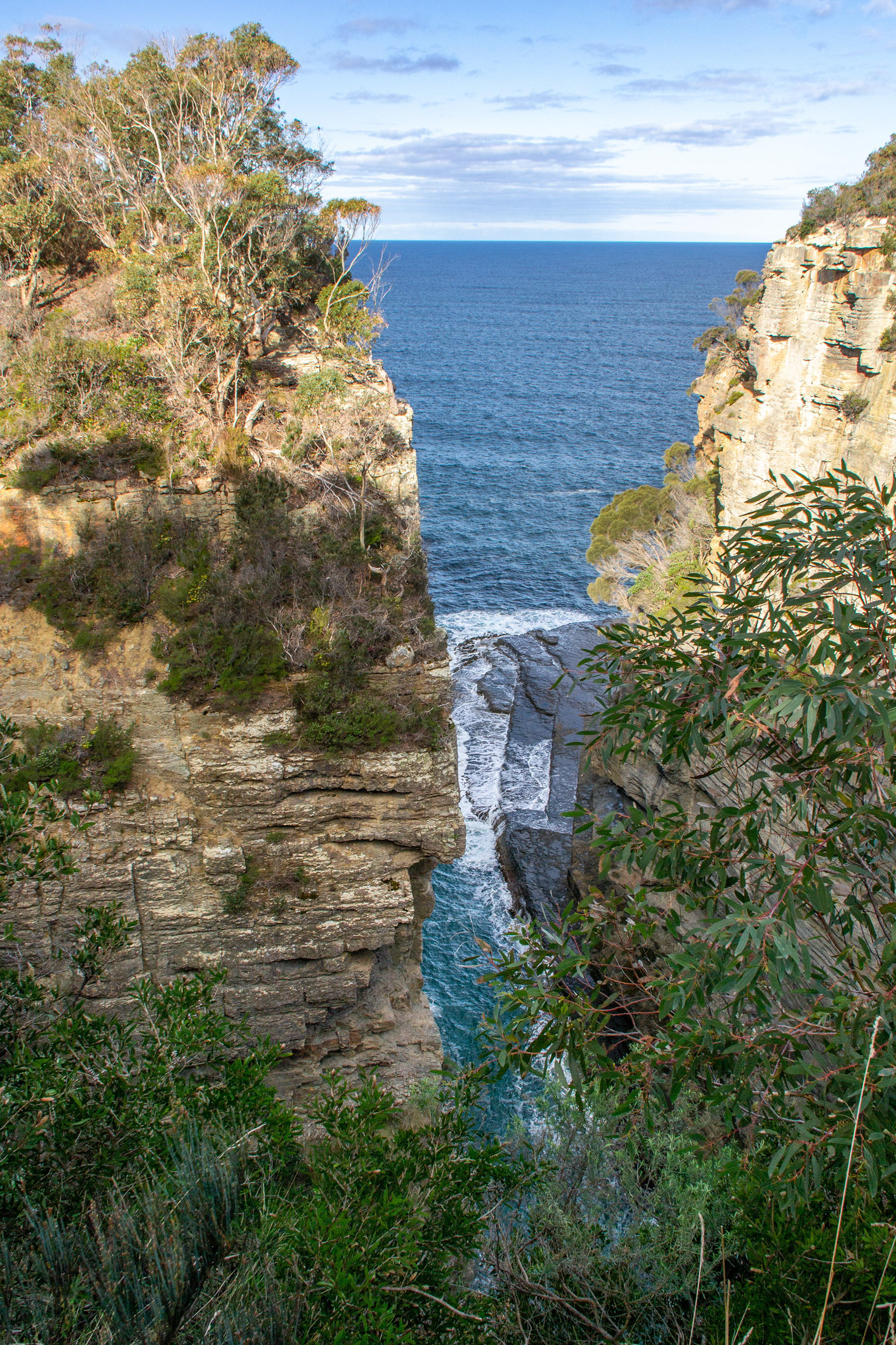 Devils Kitchen, a 60m-deep rugged cleft where swells of the Great Southern Ocean crash and swirl around the base. Even on relatively calm days this is an awesome sight.