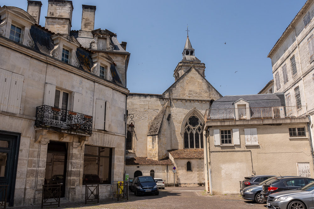 Eglise St Ledger nestled amongst the buildings of the old town.