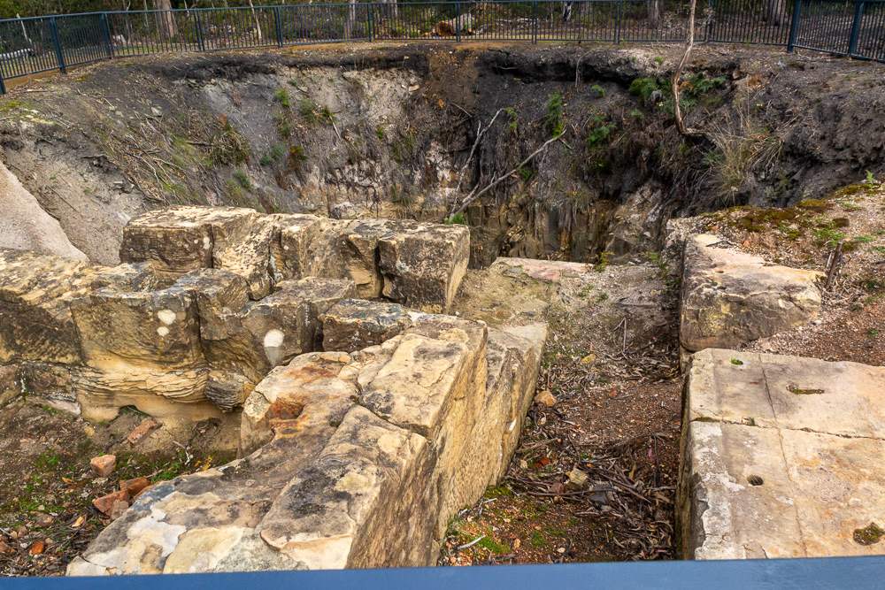 The main shaft of the coal mine dates back to c1845. Convicts were lowered by a rope windlass on a bosun chair to work the mine.