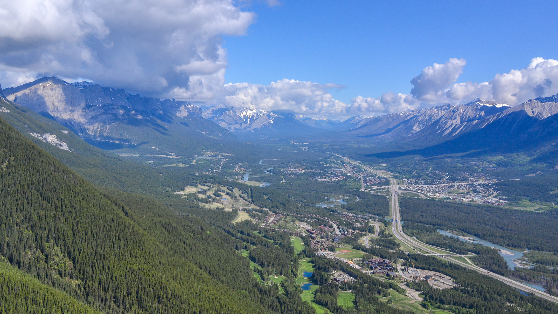 A spectacular view unfolds before us, below us is town of Banff, within Banff National Park in Alberta, Canada. It is located in Alberta's Rockies along the Trans-Canada Highway.