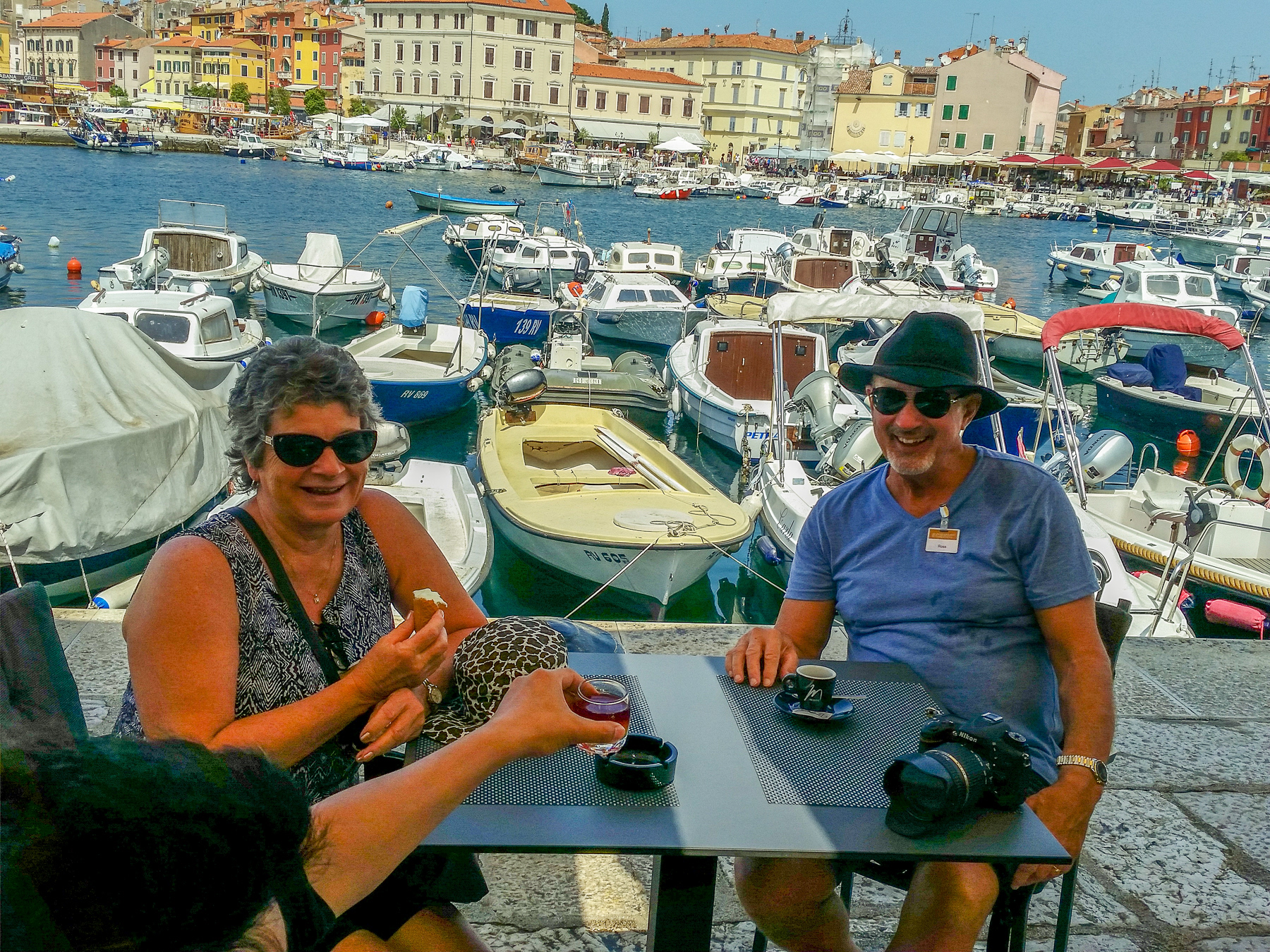 Enjoying an expresso and ice cream in a harbour-side café.