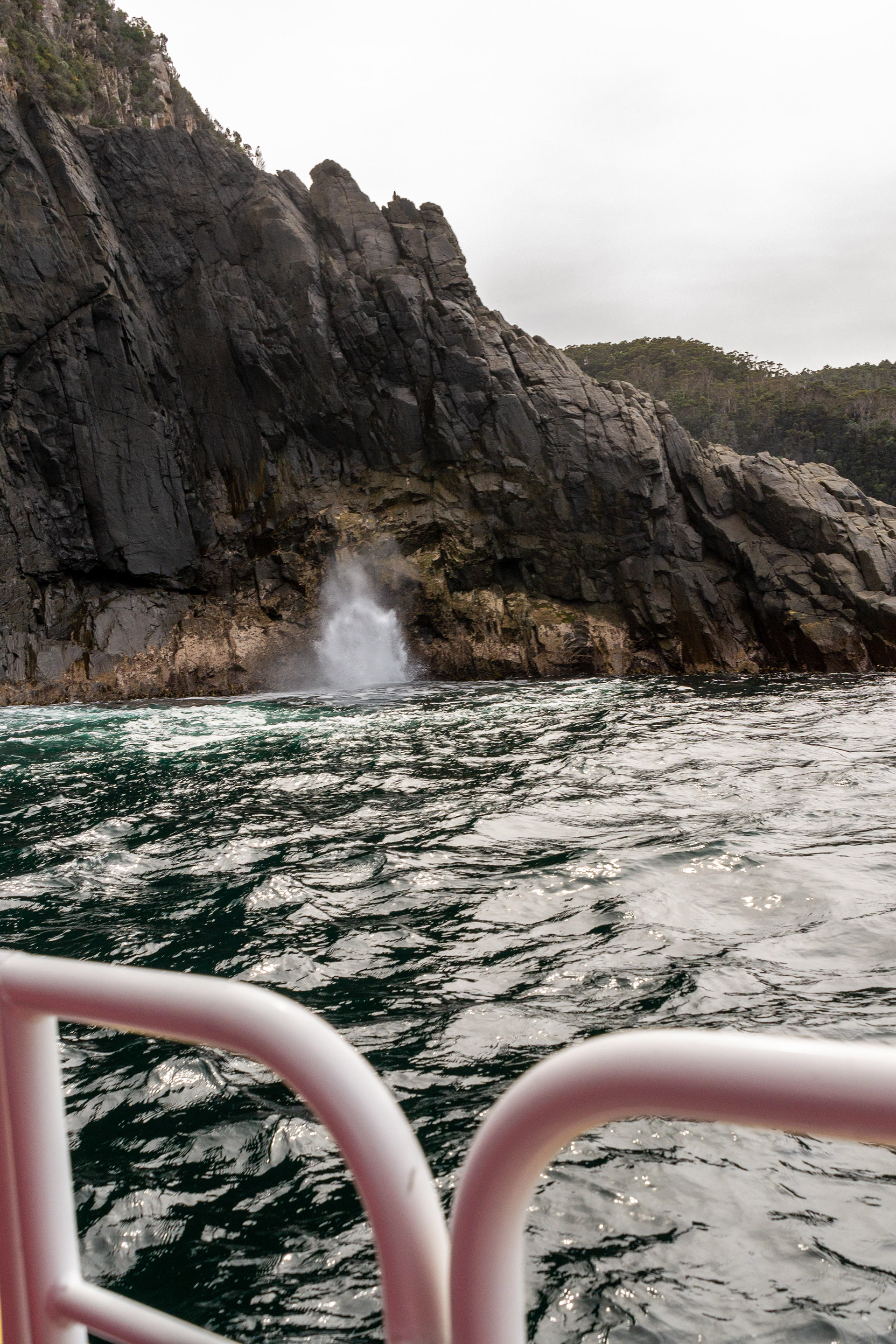 Spray explodes from the surface...