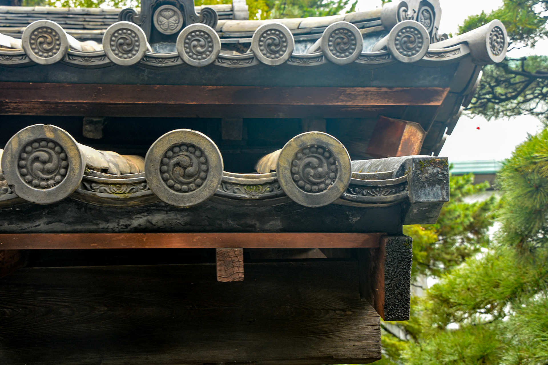 Tomoemon, a swirling comma design, is a common feature of tiled rooflines.