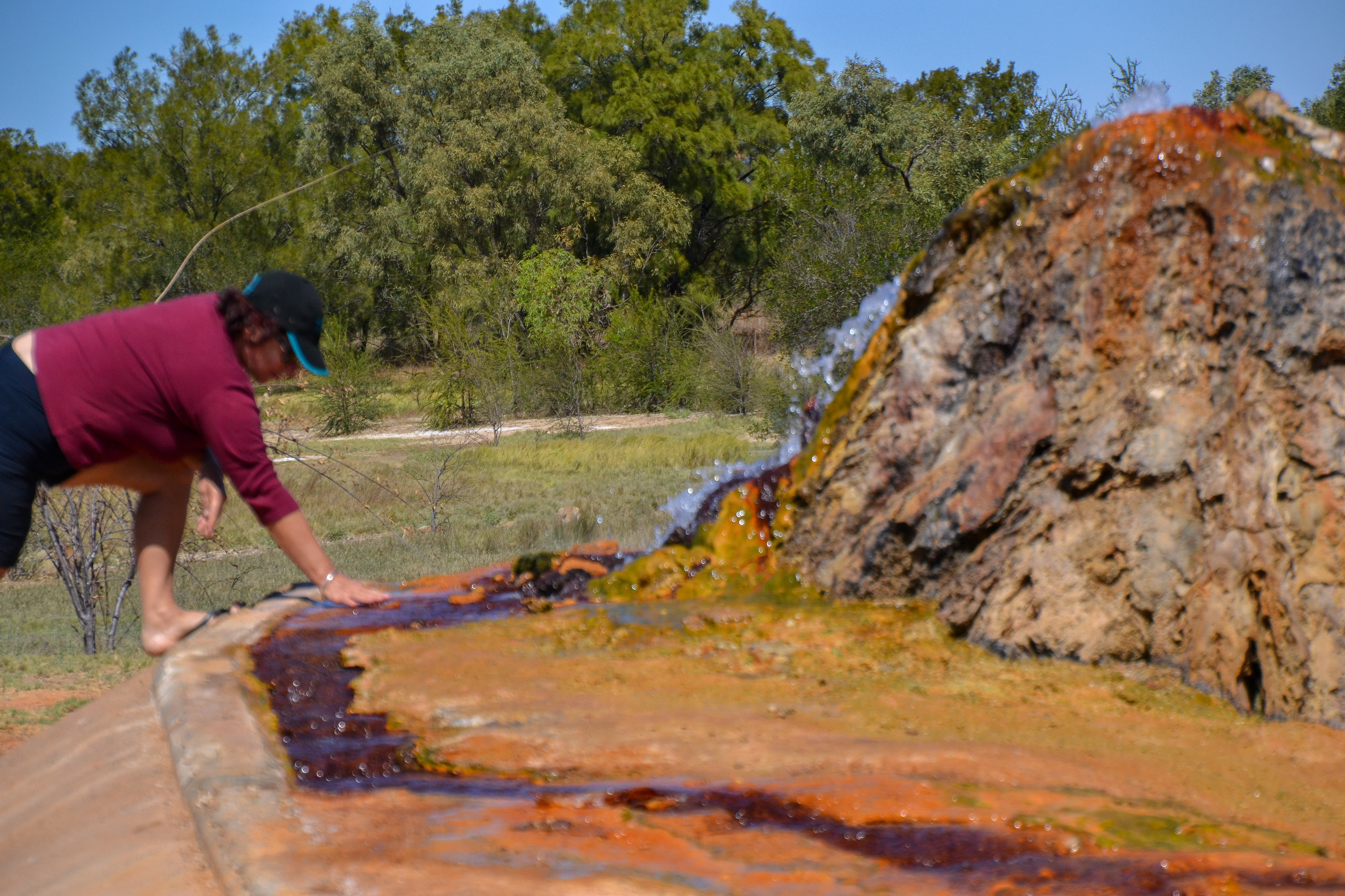 Checking the temperature (68 deg C) of the Bourketown Bore