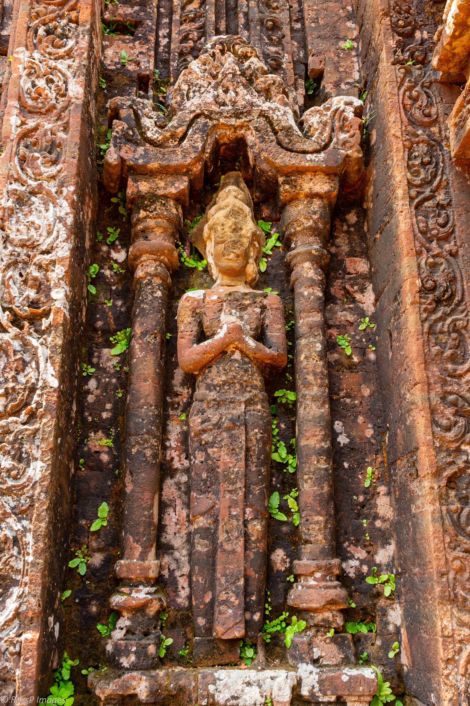 Decorative carvings have been cut directly into the bricks.