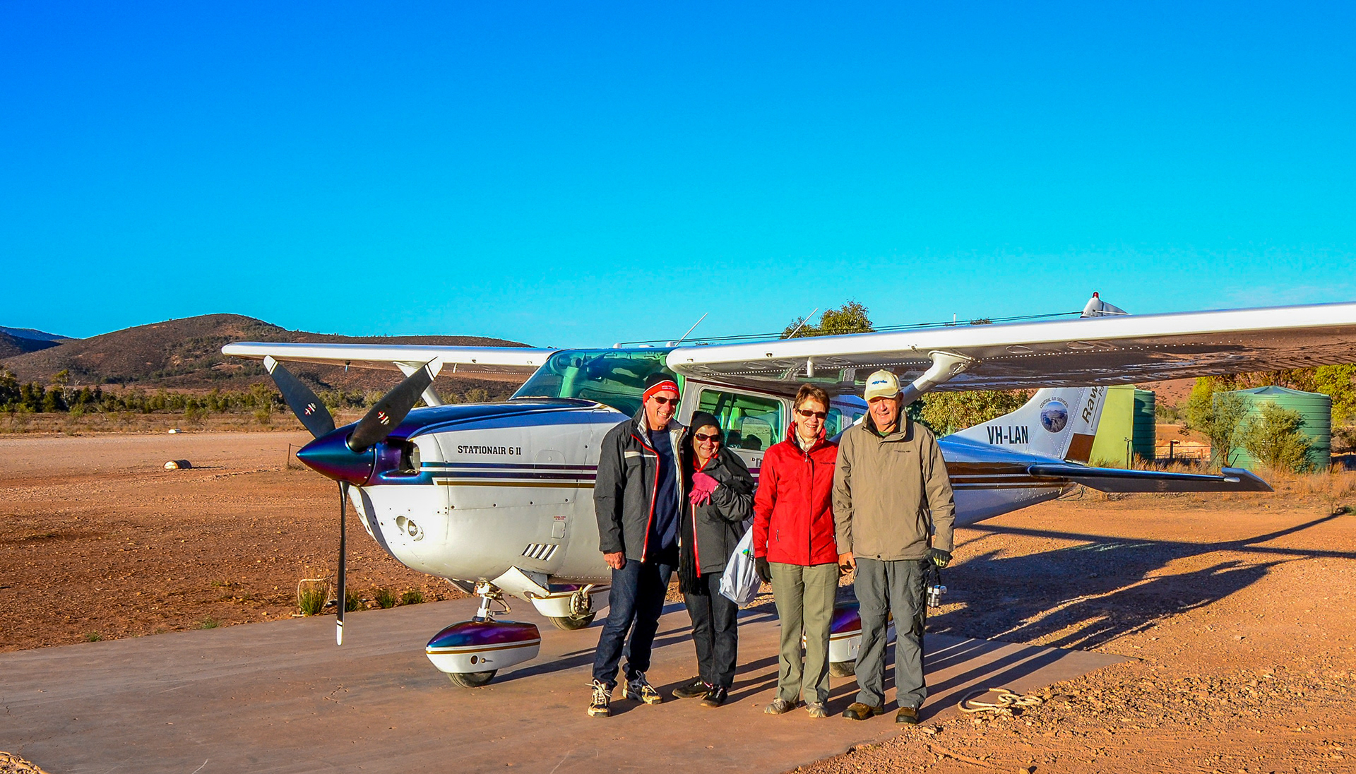 All smiles for an early morning start to our flight over Wilpena Pound.
