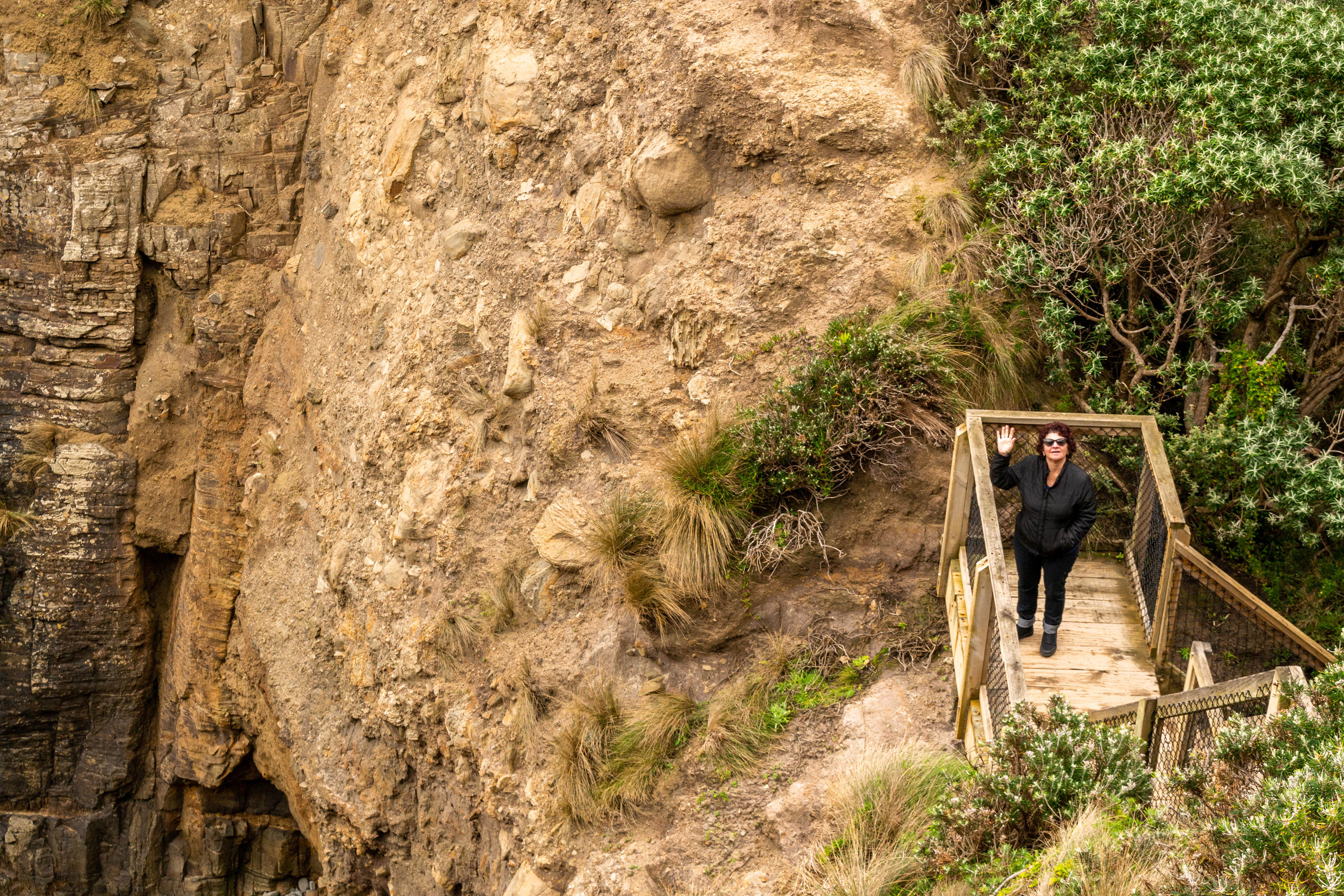 Cheryl pauses on the way down to Remarkable Cave.