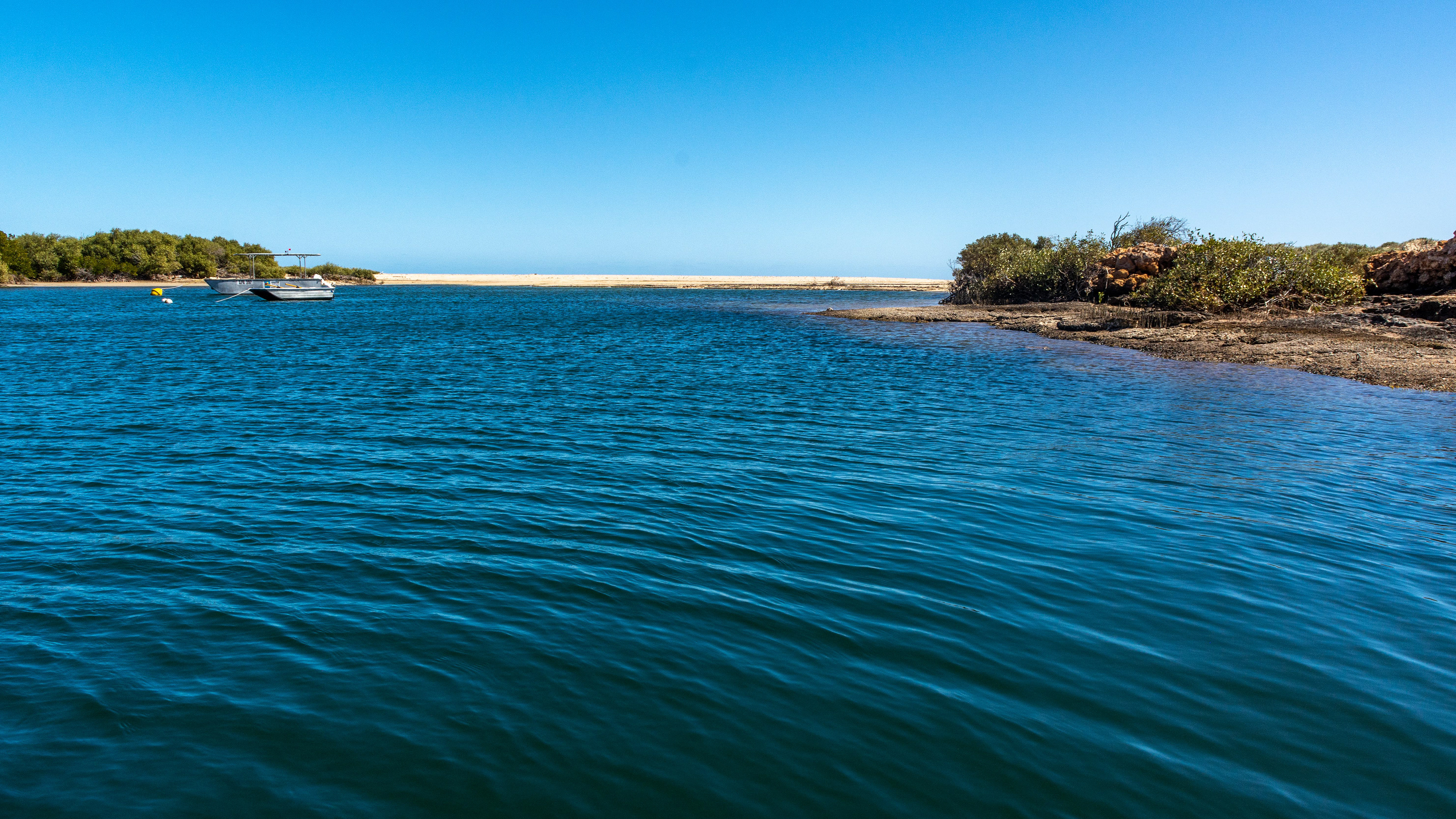 Yardie Creek looking towards the ocean. A sandbar blocks its entrance.