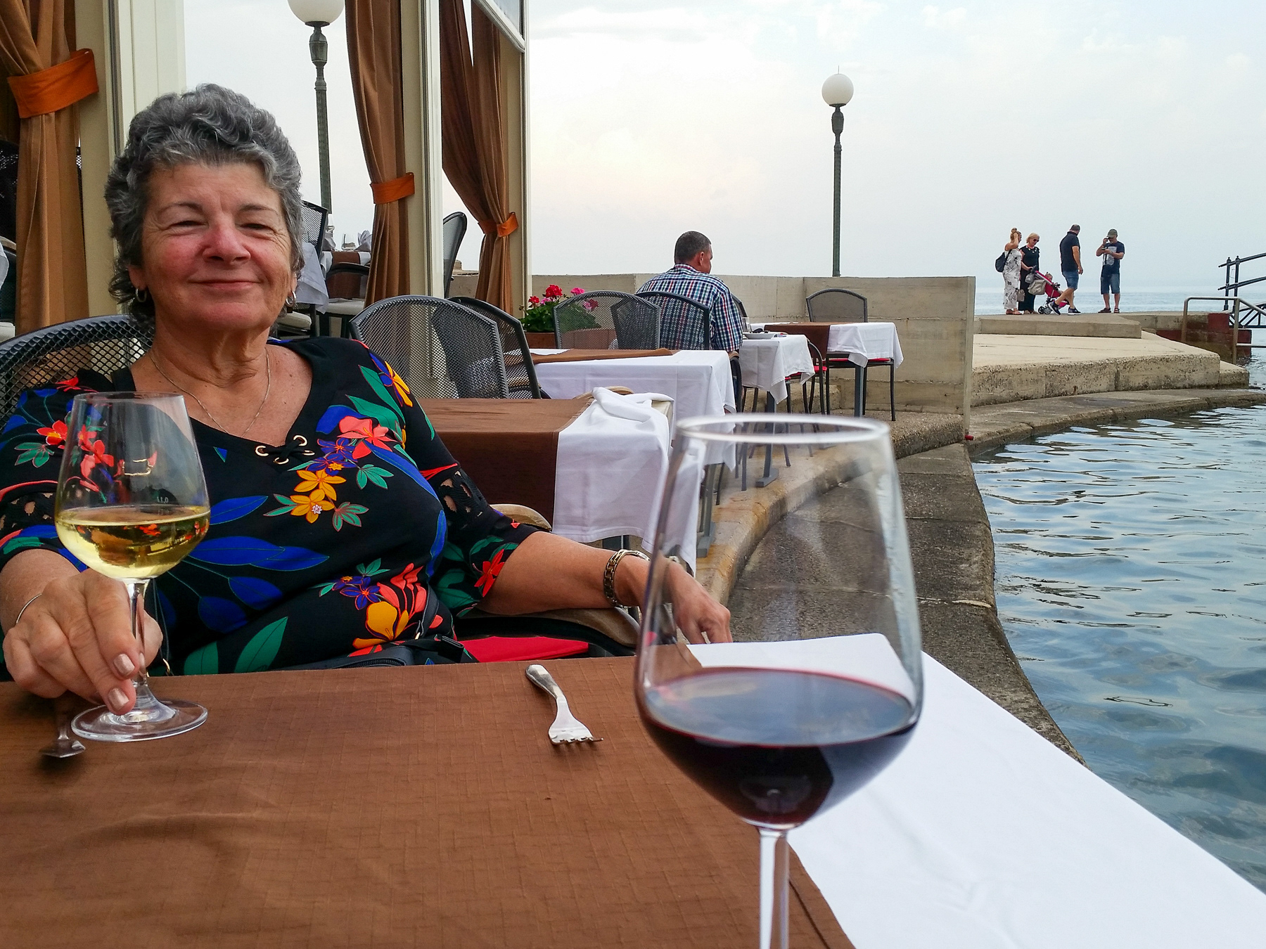 Cher enjoying a local wine.