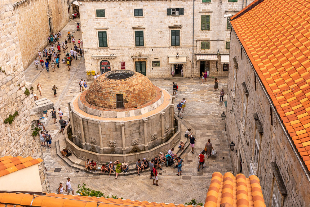Onofrio fountain viewed from above the Pile Gate. Built 1435 to 1442, he also designed and constructed a 12 km long water supply system that brought water from the Knežica spring, Šumet River. Still in use and a popular resting place for weary legs.