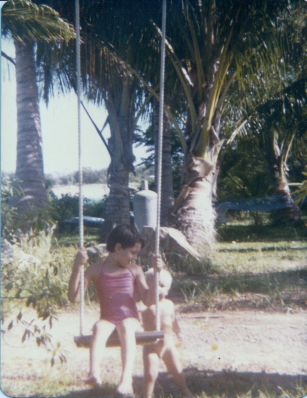Tracy with Alex pushing the swing.