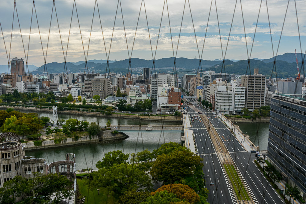 Aioi Bridge and the Hiroshima Peace Memorial (Genbaku Dome) from the Orizuru Tower. From here you get a better perspective of the target the T-shaped bridge presented from above.