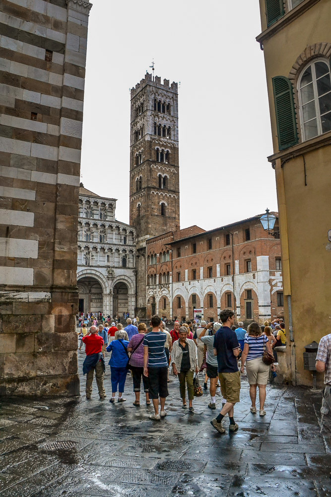 The bell tower of Cattedrale di San Martino soars high above the piazza.