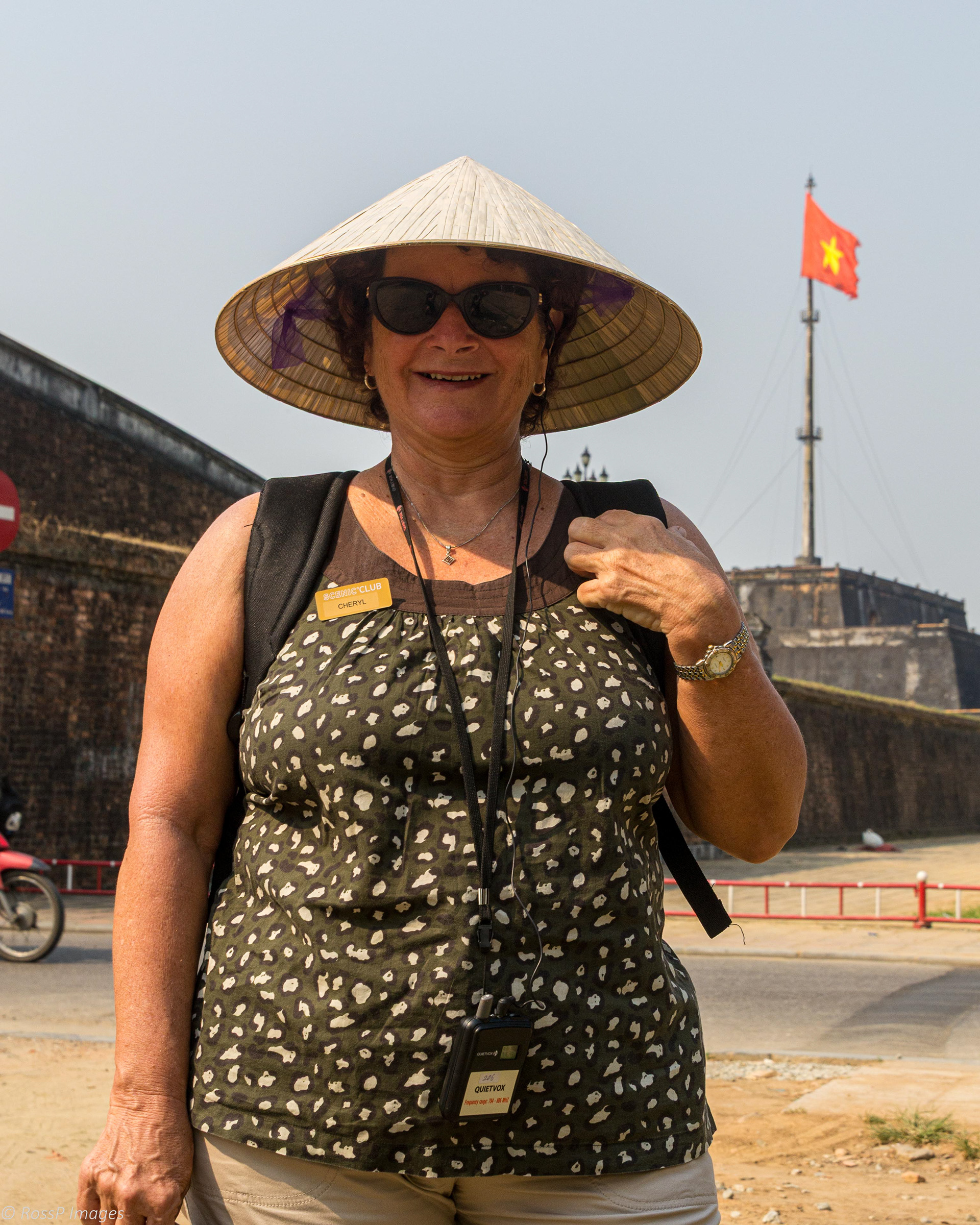 Cheryl sporting a Vietnamese conical palm-leaf hat (Non La)