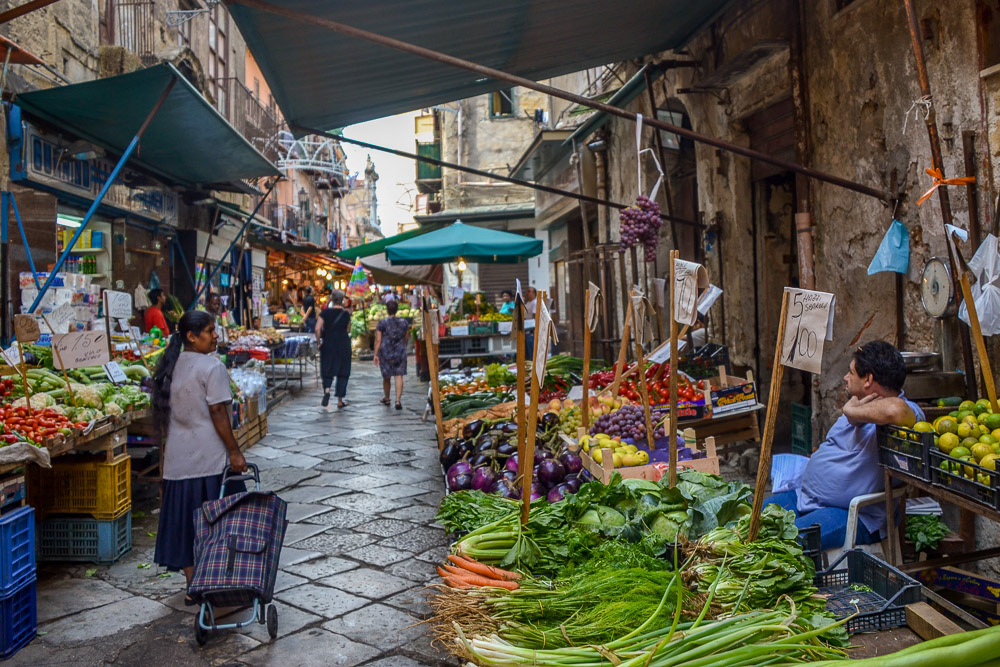 Exploring a local produce market in Palermo.
