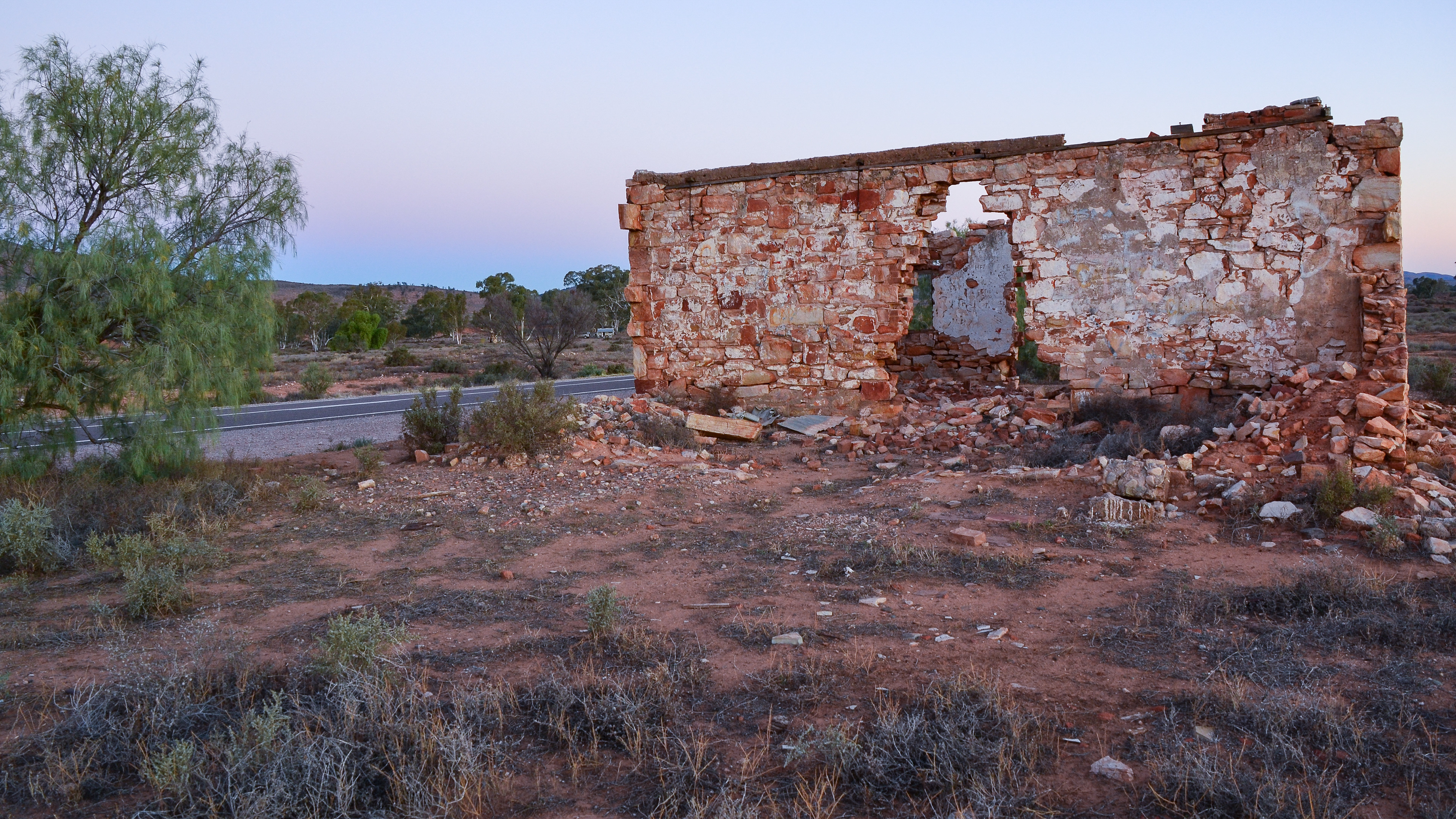 Our campsite is in the background of the decaying ruins of an old homestead, Hookina..