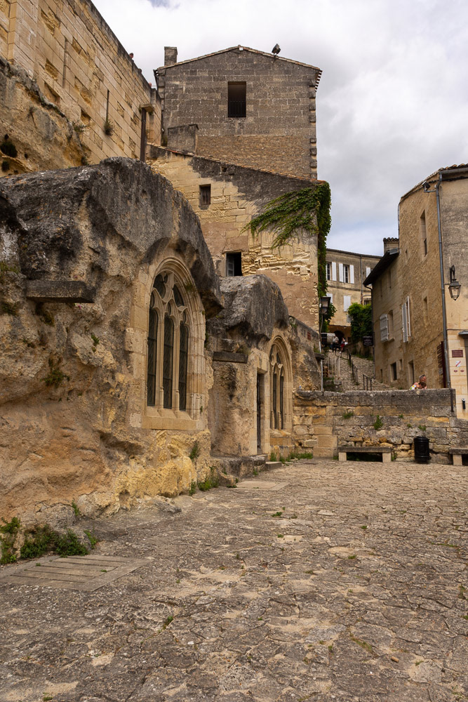 The monolithic church is carved into the hillside, above there is another level of streets and squares.