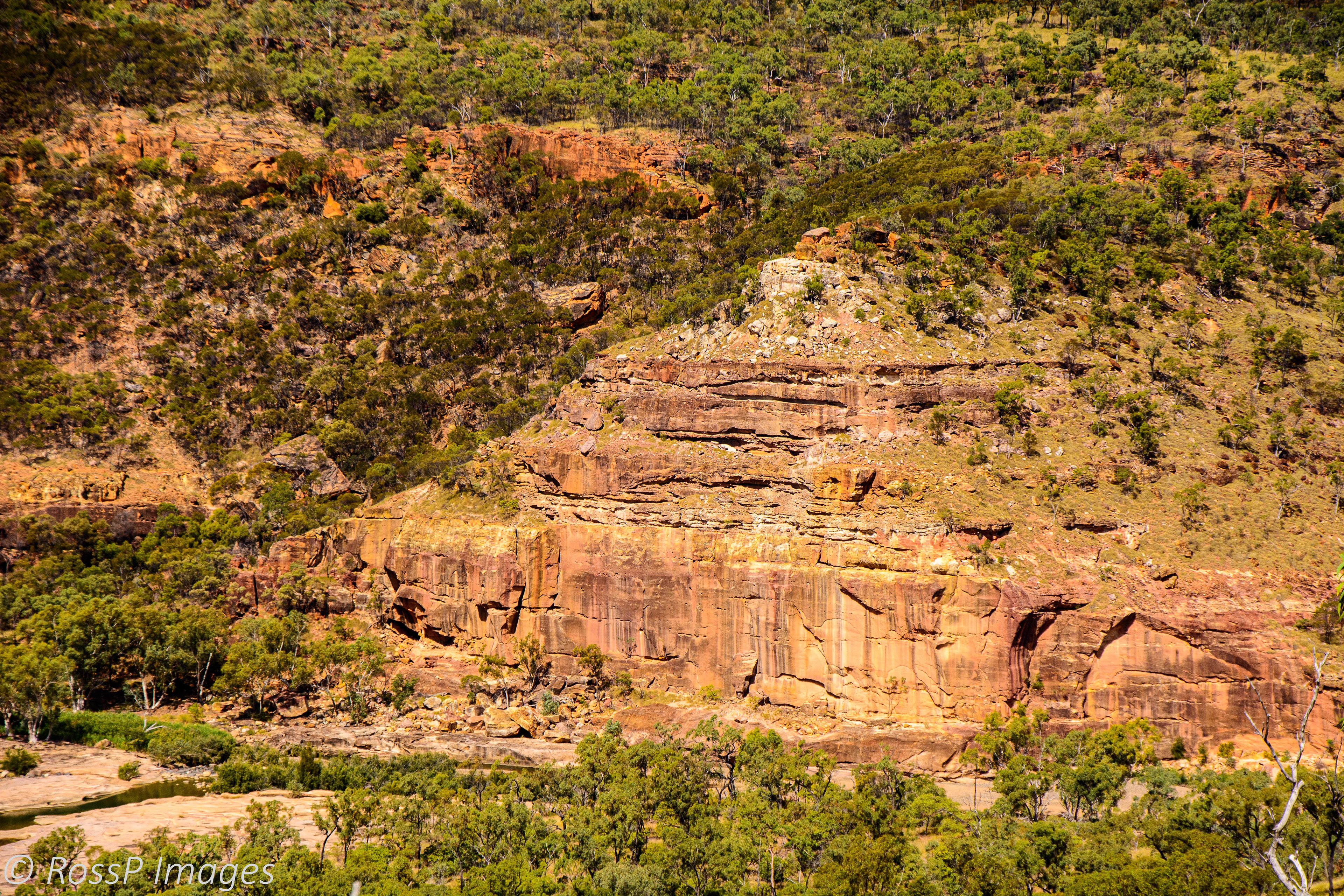 Up close to the multi-coloured sandstone face of "the Pyramid".