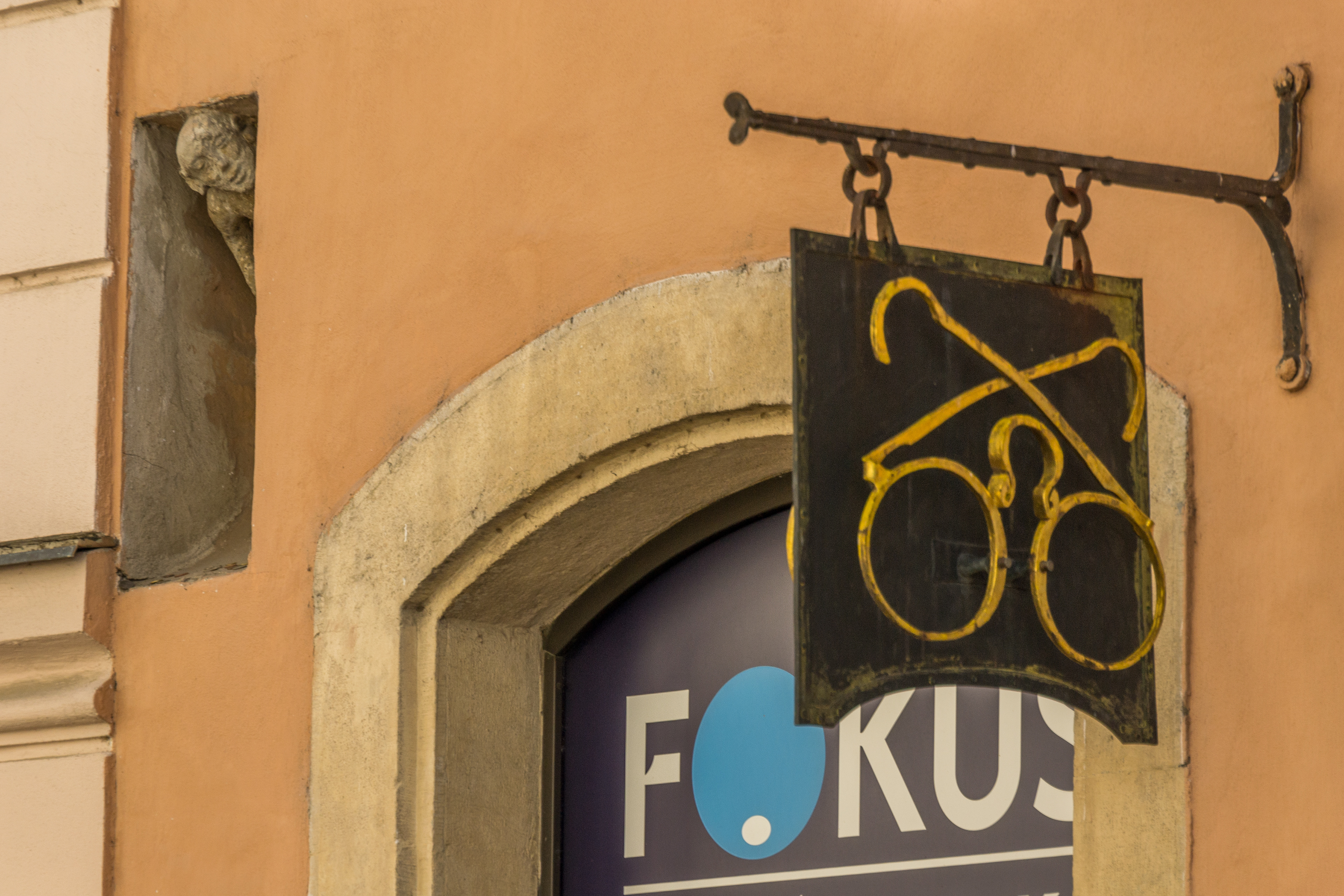 An intriguing archeticural feature of this building in the old town area is this figure peering out of an alcove high above the street.