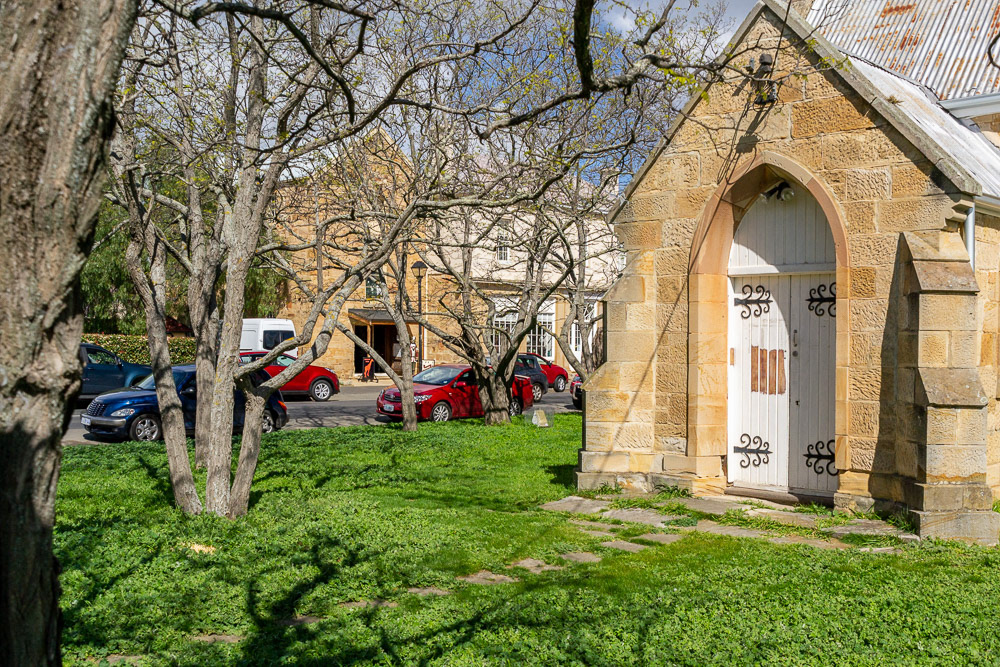 No longer in use as a church these ornately hinged doors bar entry to the public.
