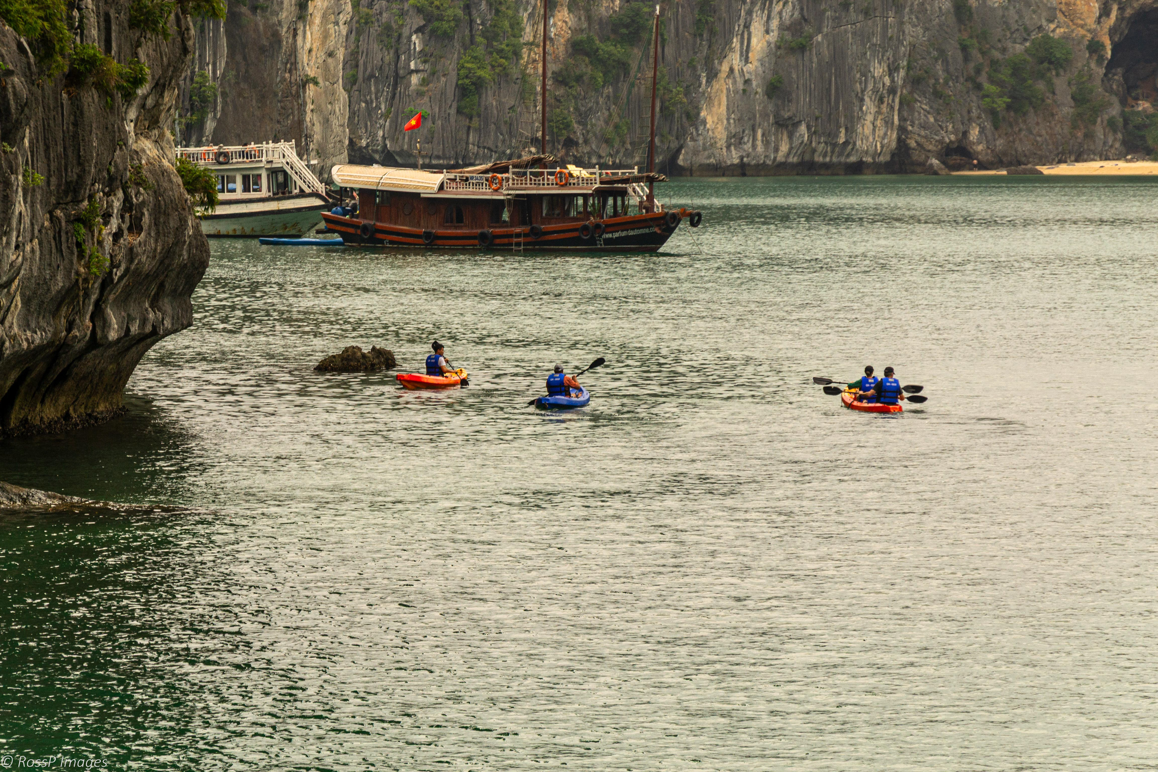 Exploring the islets by kayak we encounter other cruise boats.